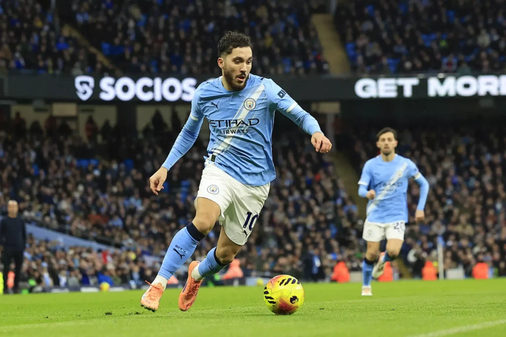 Rayan Cherki dribbling on the flank for Manchester City / Extratime Talk